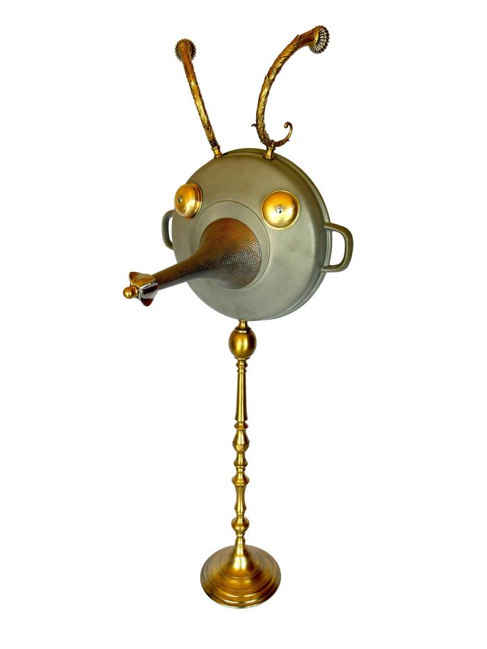 Faun figure made from a saucepan with taps for eyes, on a lamp base - main view