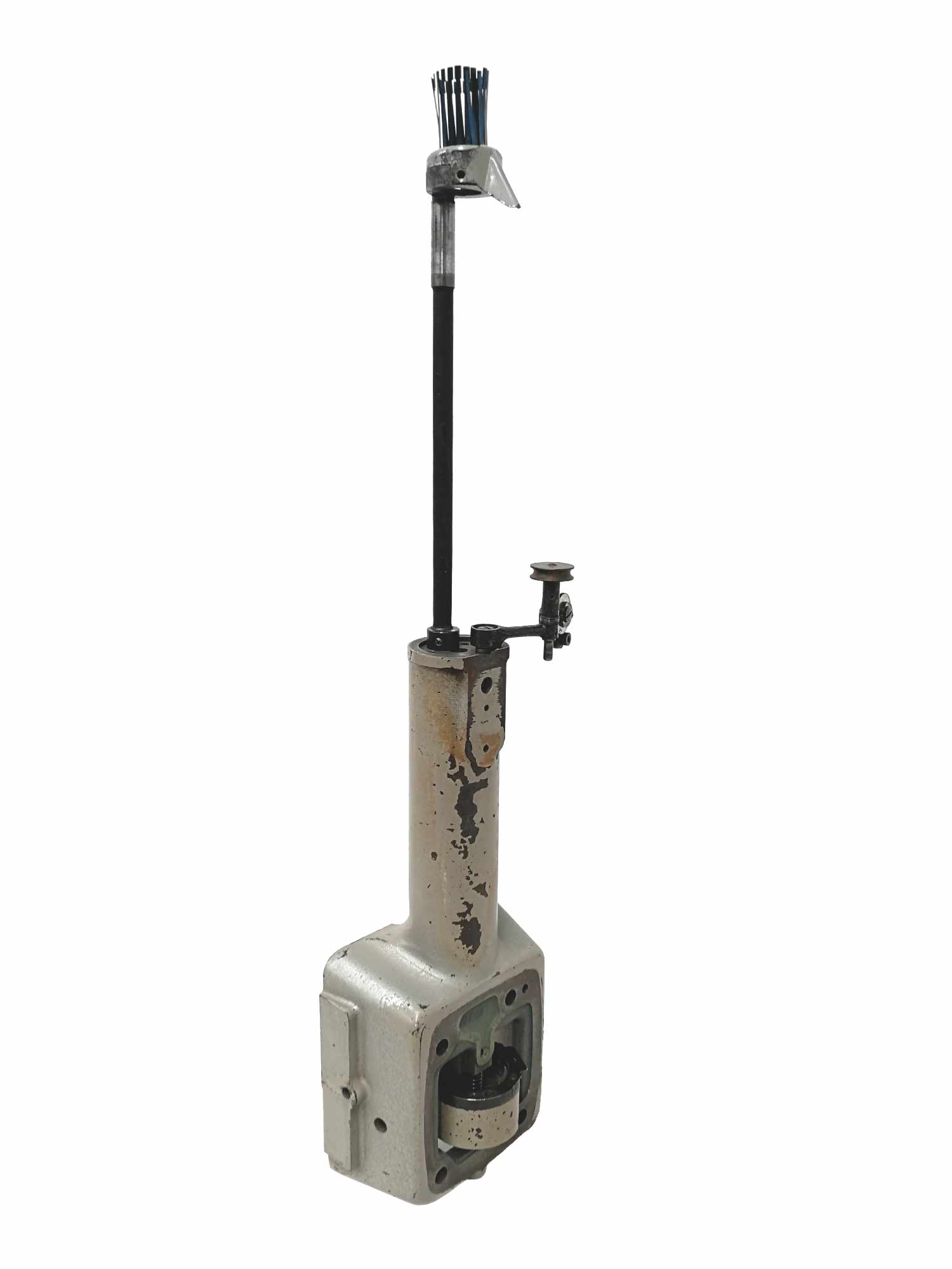 A tall sculptural bird made from a sewing machine part and wires as a crest.